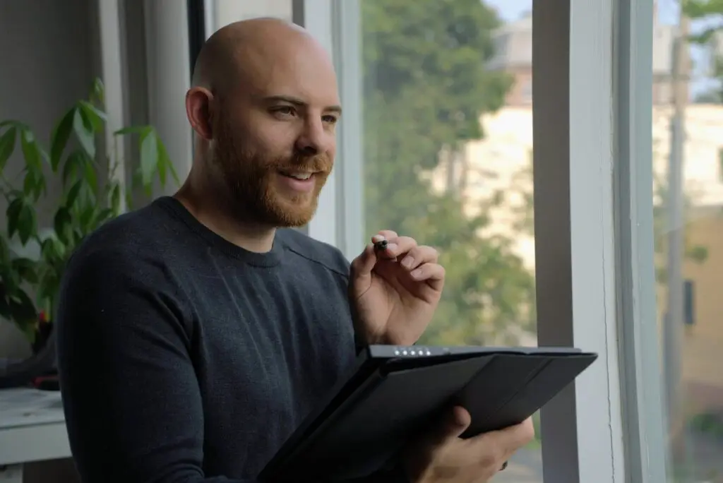 McGinnis using Tablet